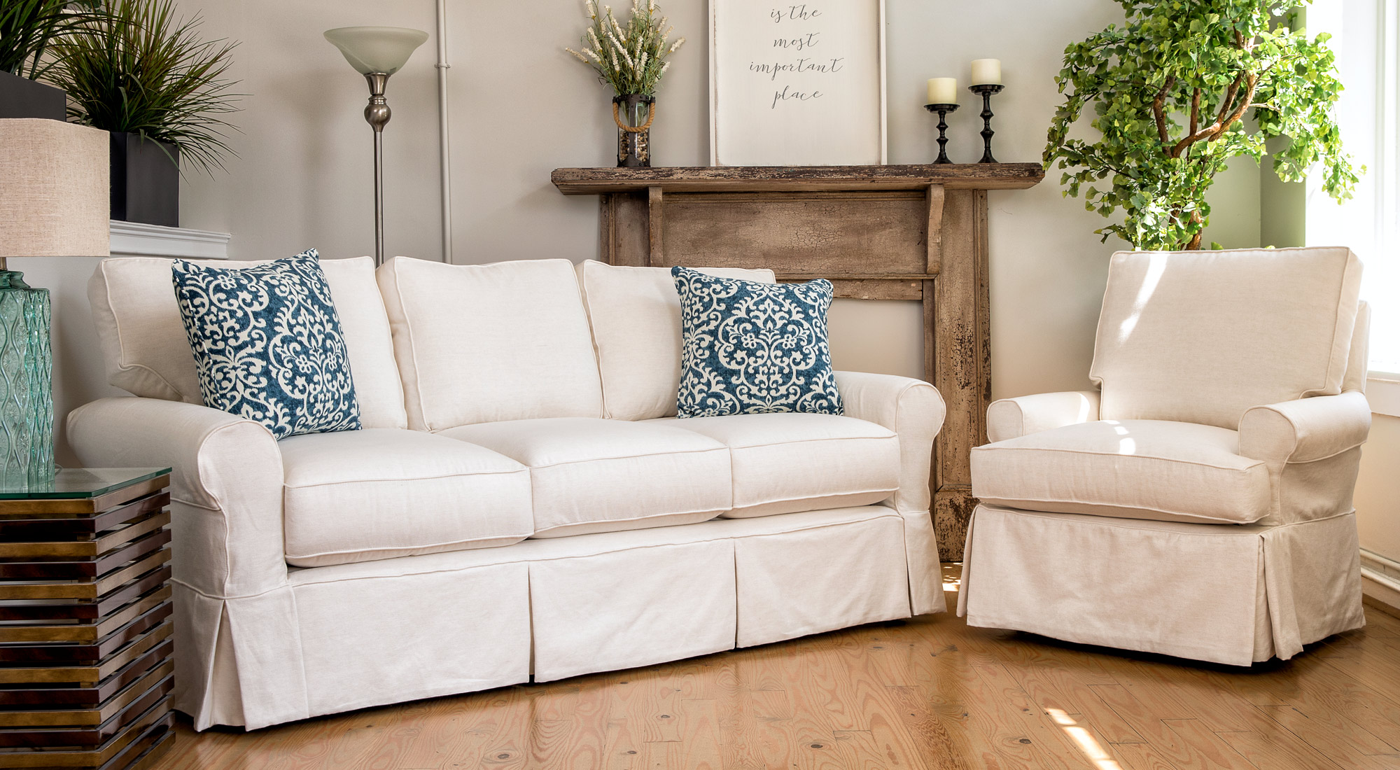 http://www.shopfourseasonsfurniture.com/images/site-wide/white-sofa-chair.jpg